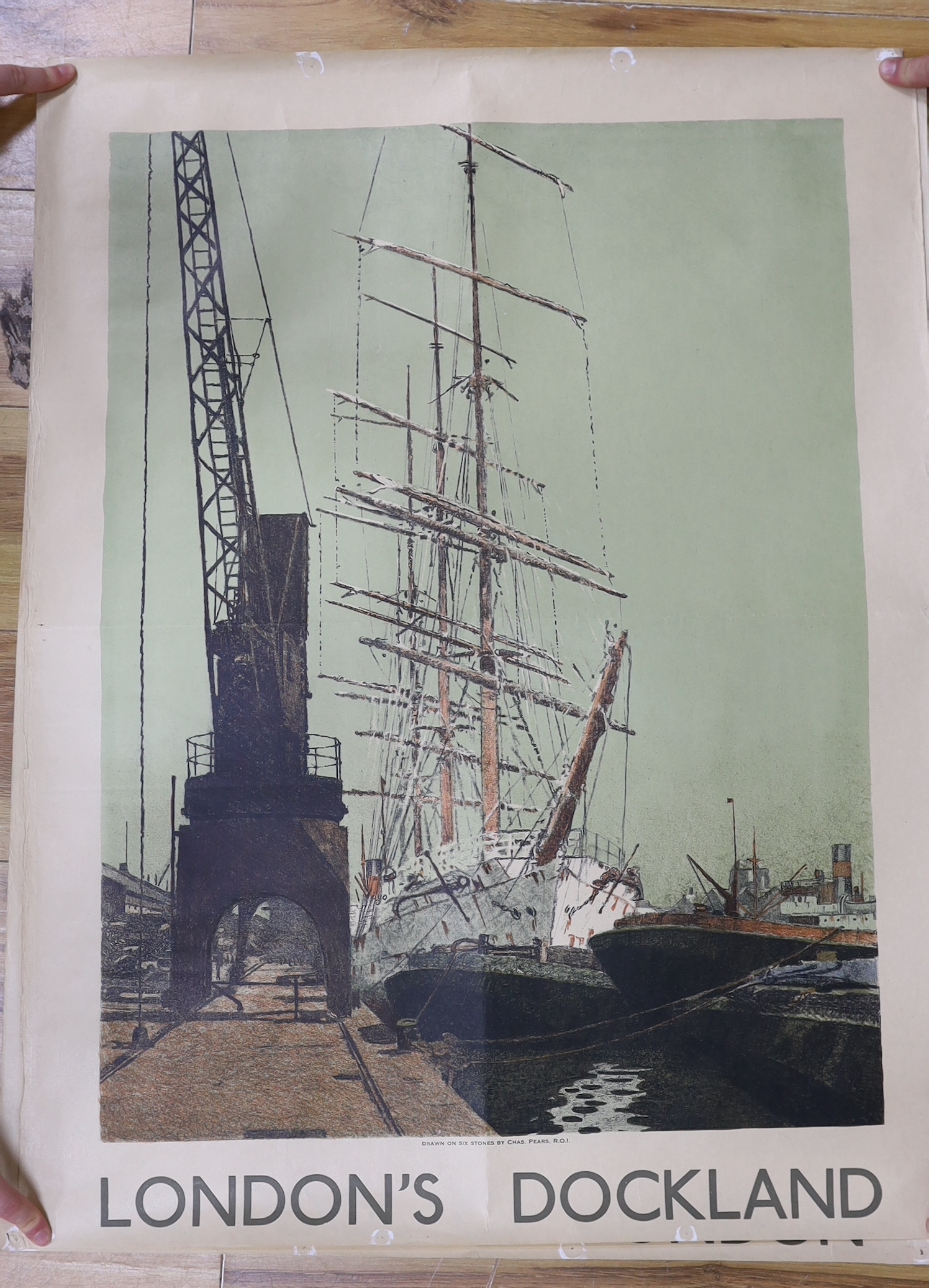 Charles Pears (1873-1958), three lithographic posters, 'Greenwich Reach', 'London's Dockland' and 'Pool of London', 84.5 x 63cm,. unframed (cut down)